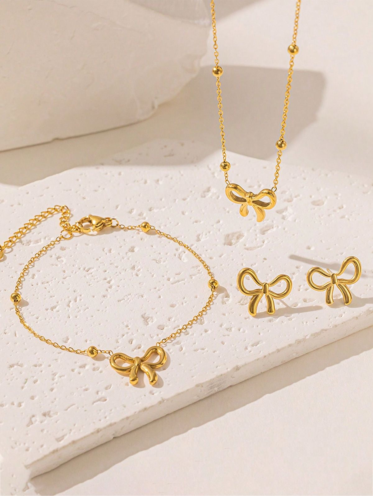 Casual stainless steal bow shape set